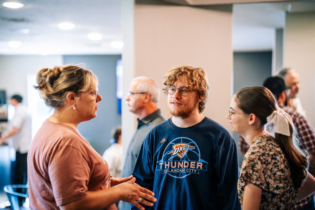People talking together in the Motion Church lobby